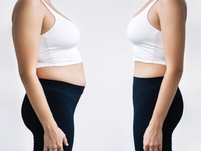 Woman in profile with a belly with excess fat and toned slim stomach before and after losing weight on gray background. Result of diet, liposuction, training. Getting rid of overweight. Comparison